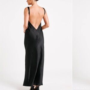 Black satin open back meshki dress